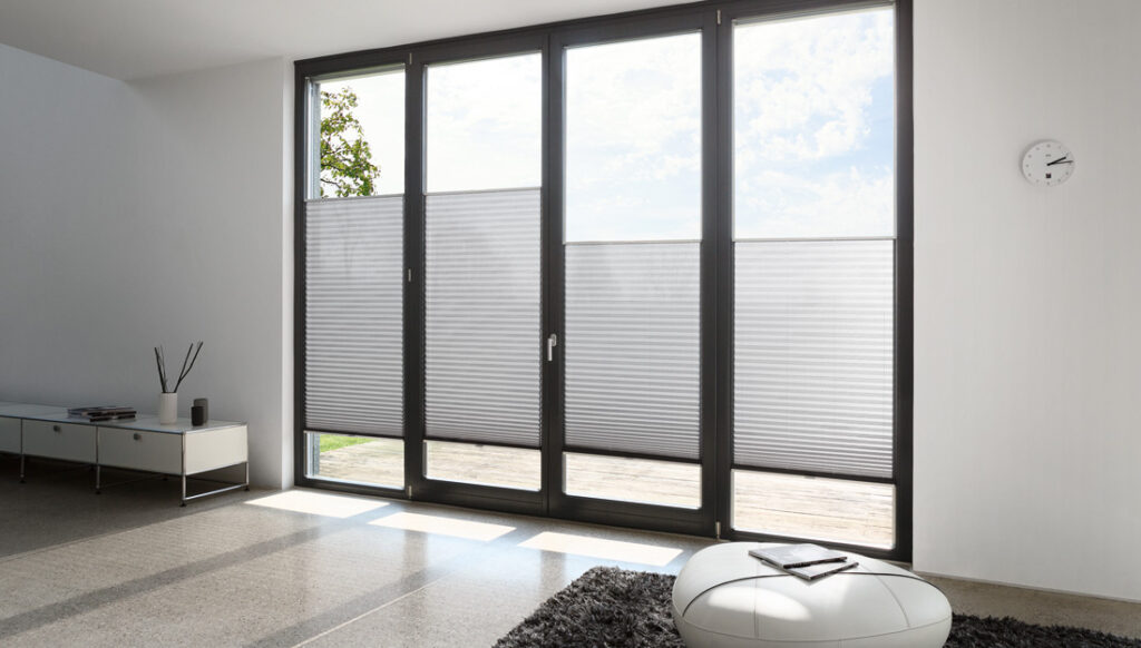 MHZ Blinds mounted on a glass door in a home