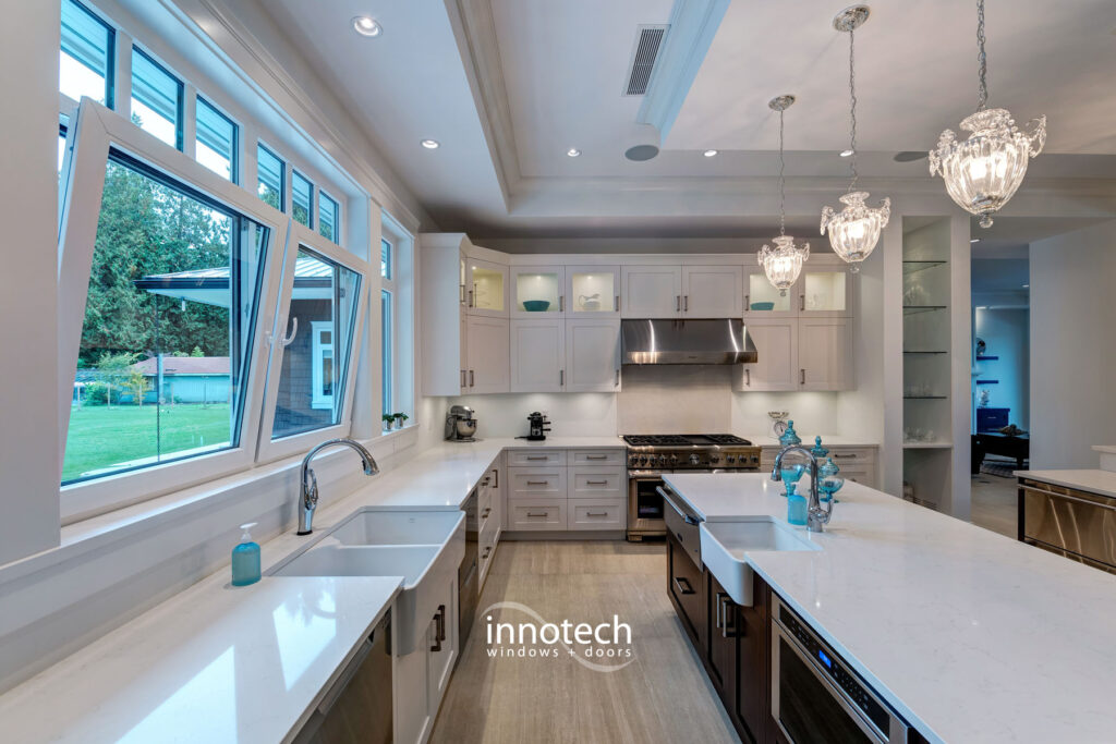 white tilt and turn windows in a kitchen above the sink